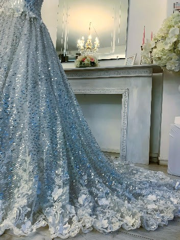 Robe de mariée princesse sequins argentés : Glamour et féerie